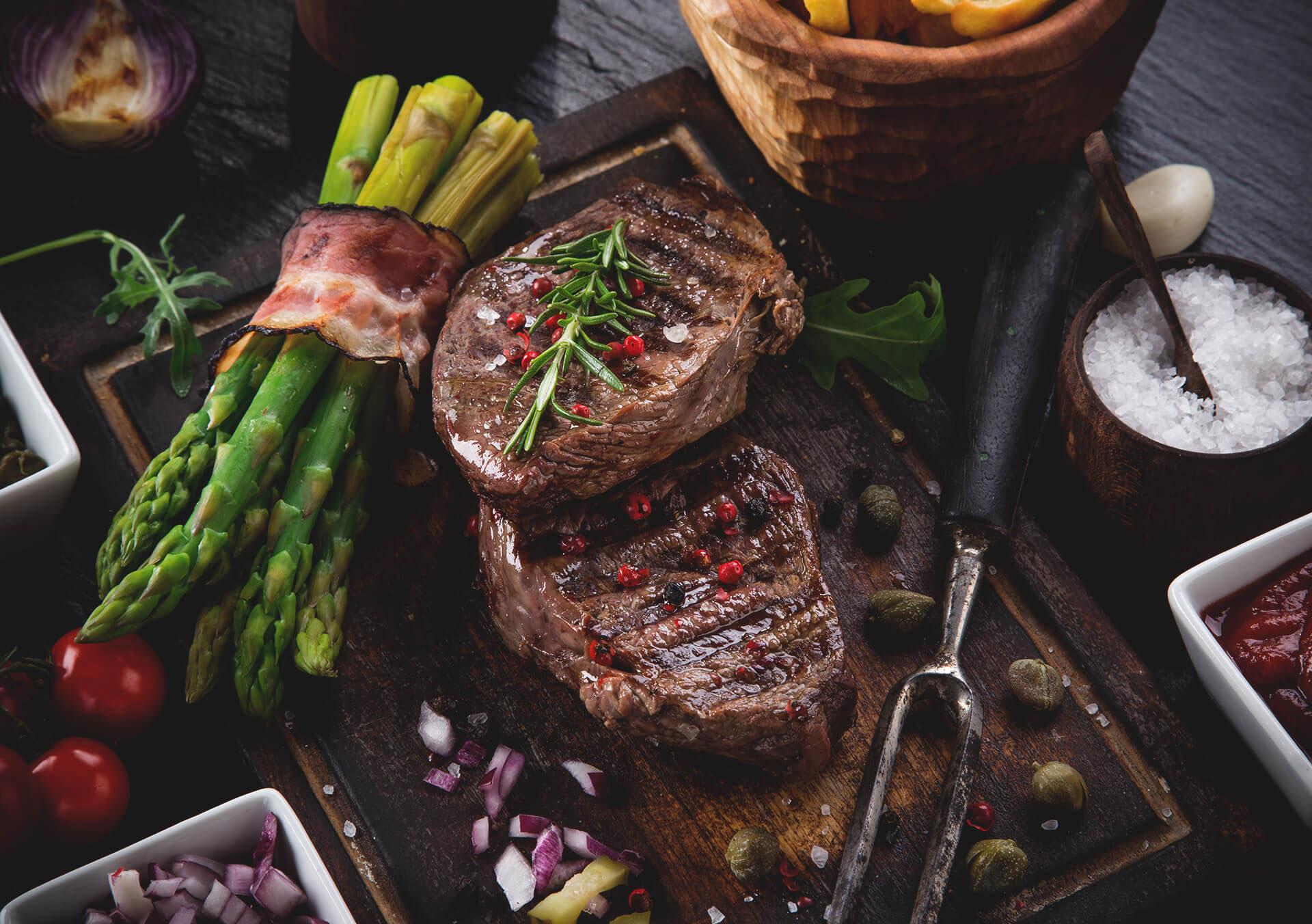Grilled steak with herbs and vegetables, ready for the table